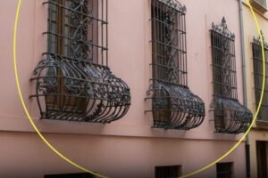 Why Are Some Window Bars Curved at the Bottom?