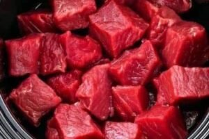 Put raw cubed beef in a slow cooker with these 3 ingredients. You won’t believe how good it tastes