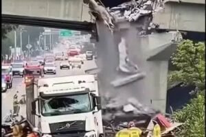 TOTAL CHAOS AS MASSIVE TRUCK SLAMS INTO OVERPASS SHATTERING MORNING COMMUTE